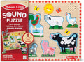 Wooden 8-piece farm animal sound puzzle featuring colorful peg pieces of a cow, pig, and sheep on a wood board.