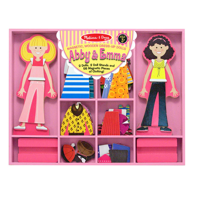 Two wooden dolls, one blonde and one brunette, in a pink tray with compartments of colorful magnetic clothes.