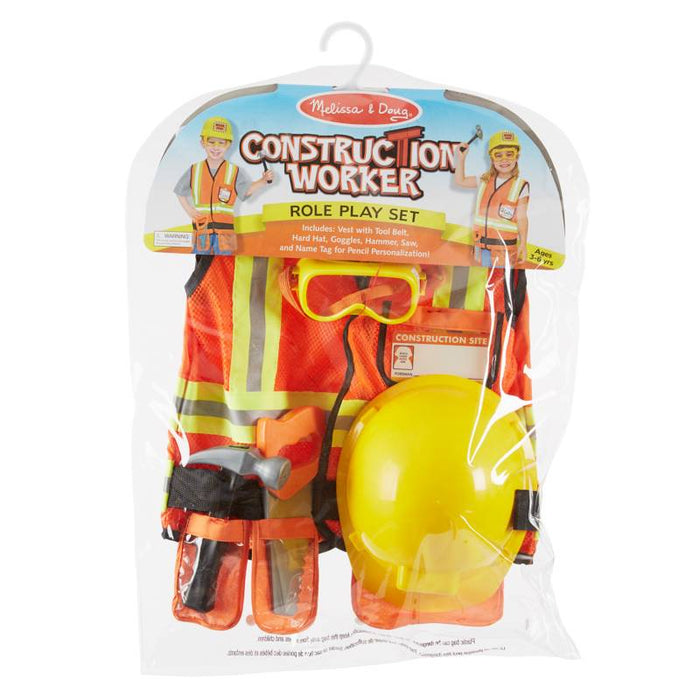 Construction worker costume set in clear packaging with orange vest, yellow hard hat, goggles, and toy tools.