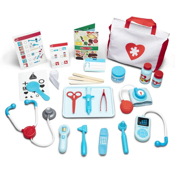 Toy doctor set with a white and red bag, blue stethoscope, and various light blue medical tools on a white background.