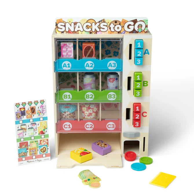 Colorful wooden toy vending machine with three rows of play food, numbered buttons, plastic coins, and a menu card.