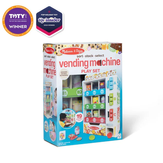 Box for a white wooden toy vending machine with colorful play snacks, coins, and top toy award badges.