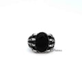 Men's stainless steel claw ring by Glitters featuring antiqued finish and black CZ stone casting for a bold, stylish look.