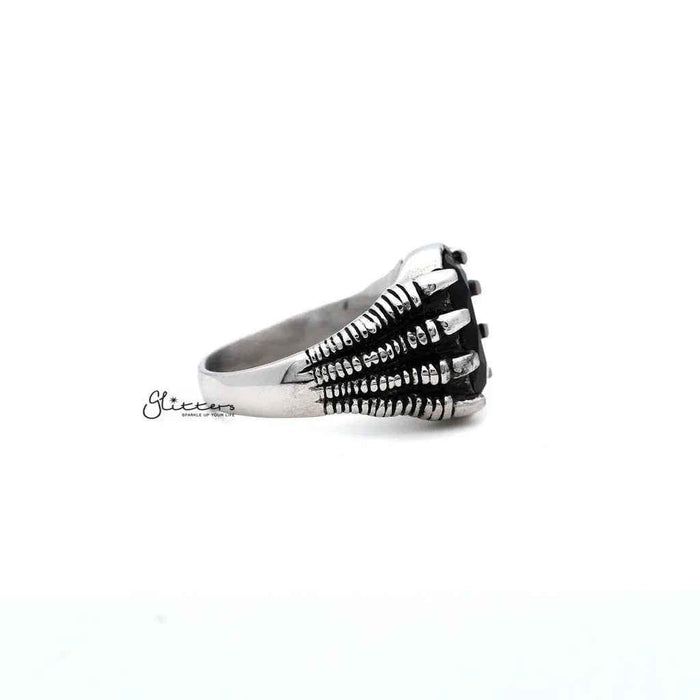 Men's antiqued stainless steel claw ring with black CZ stone, cast by Glitters, showcasing a bold, stylish jewelry design.