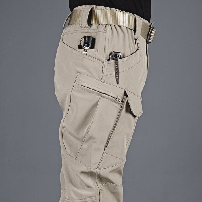 Men's black tactical cargo pants by dealonline.co.nz, water-resistant ripstop fabric with flexible design and multiple pockets.