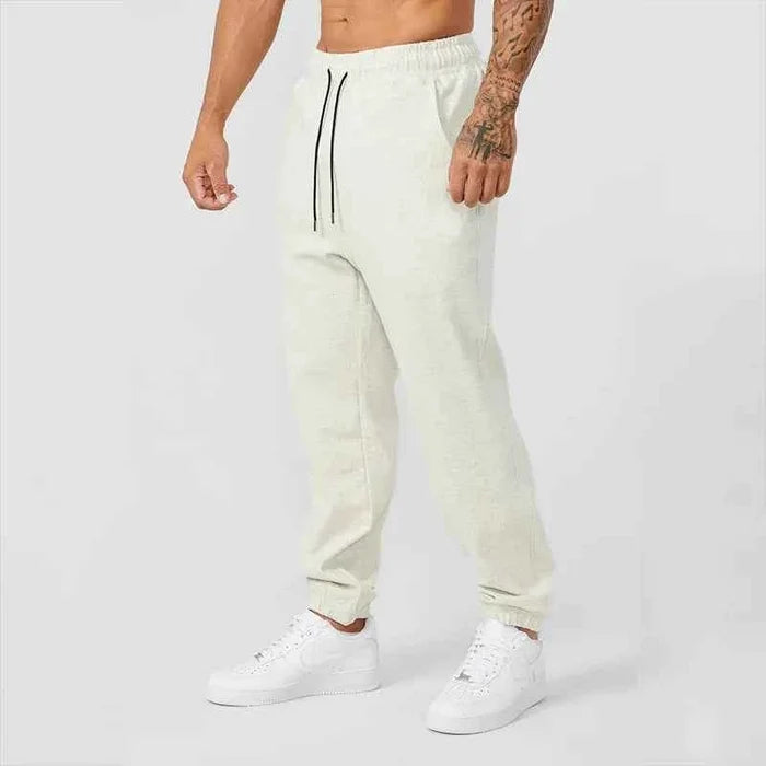 Men's black athletic joggers with side stripe, Mead's Supply & Equipment Outfitters limited men's track sweatpants, casual sportswear