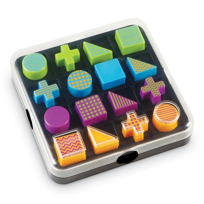 A 4x4 grid of colorful green, blue, purple, and orange patterned geometric blocks in a clear plastic travel case.