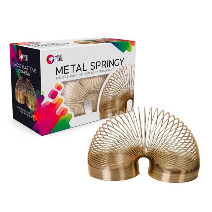 Bronze-colored metal springy toy arched next to its white packaging box featuring vibrant, colorful paint splashes.