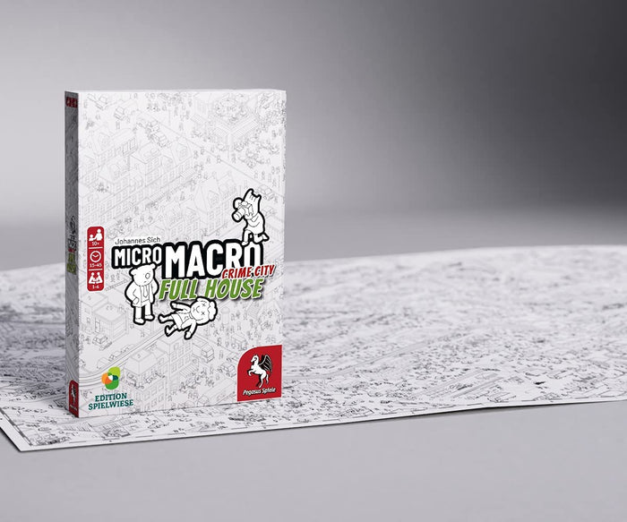 White board game box featuring black and white line art of a city, standing on a matching large illustrated map.