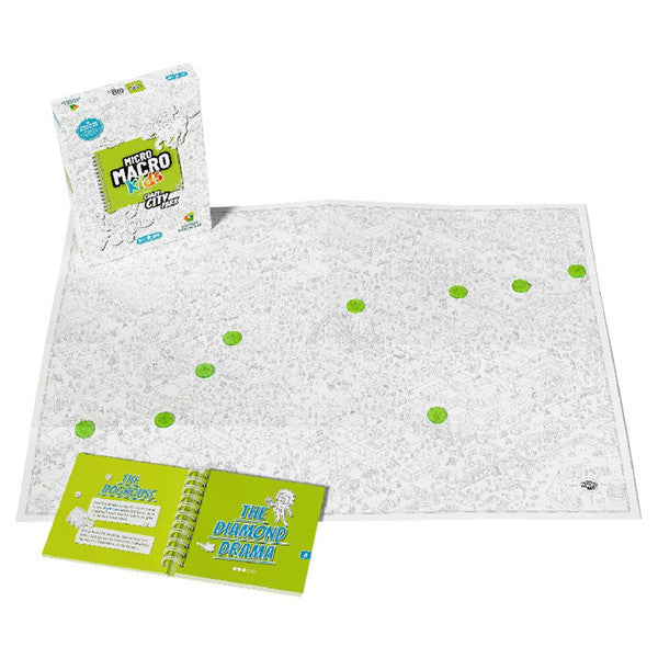 White game box, large black and white illustrated map with green circles, and a green spiral-bound booklet.