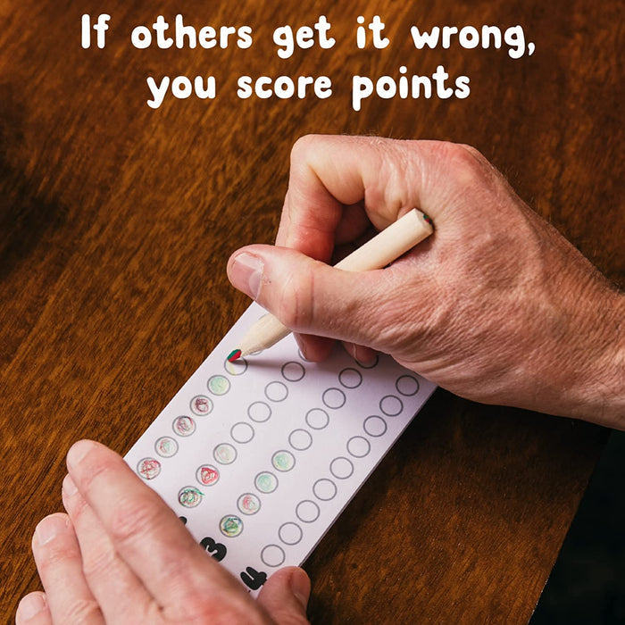 Hands coloring circles on a scorepad with small wooden pencils. Text: If others get it wrong, you score points.