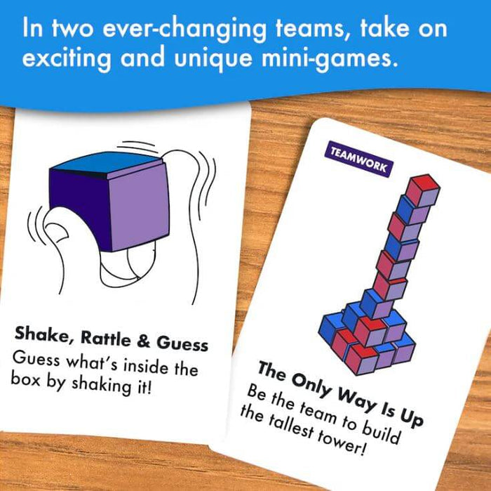 Two game cards on a wooden surface showing a hand shaking a purple box and a tall tower of red and blue blocks.