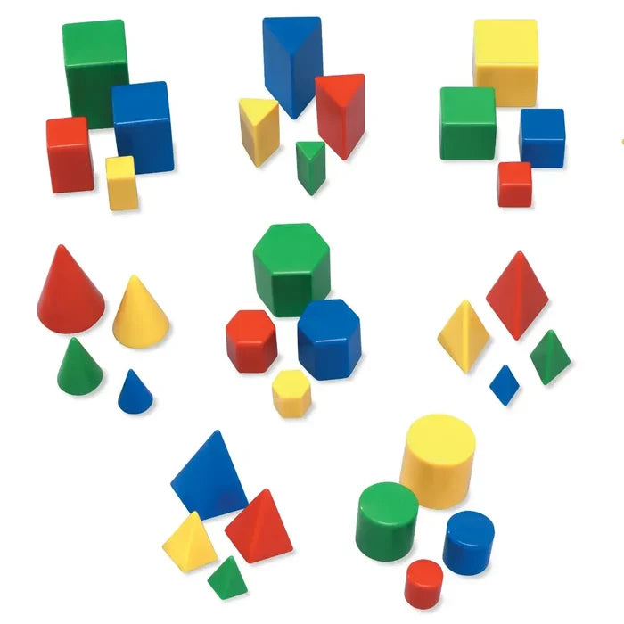 Colorful 3D geometric shapes including red, blue, yellow, and green cubes, cones, cylinders, and pyramids.