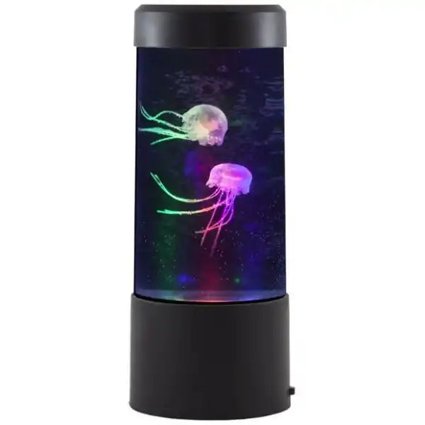 Round black tank with two glowing pink and green artificial jellyfish swimming in blue water with colorful LED lighting.