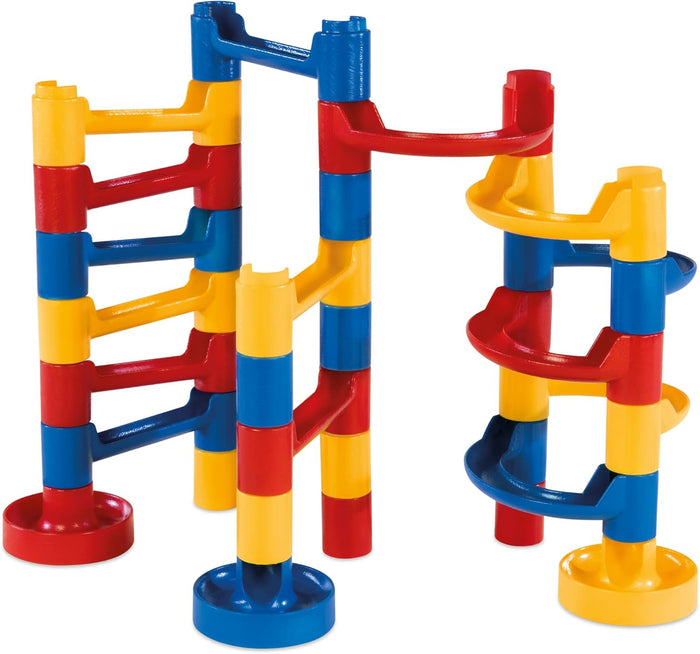 Interlocking red, yellow, and blue plastic towers and chutes forming a colorful toy marble run structure.