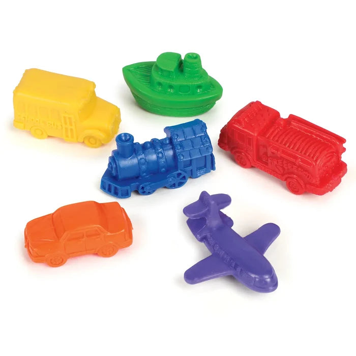 Six plastic vehicle counters: yellow bus, green boat, blue train, red fire truck, orange car, and purple airplane.