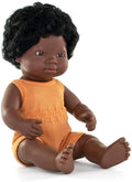 Sitting dark-skinned baby doll with Down syndrome features, black curly hair, and an orange knit romper.