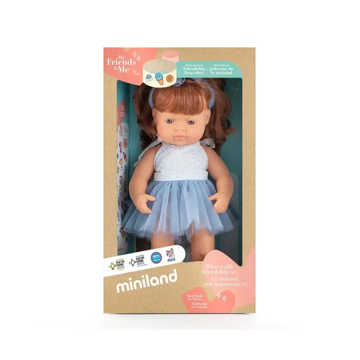 Redhead girl doll wearing a blue tulle dress and headband, packaged in its original miniland window box.