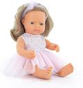Seated doll with dark blonde hair, green eyes, white polka dot top, pink mesh tutu skirt, and a white tulle headband.