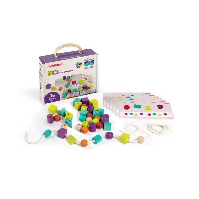 36 colorful wooden geometric beads, white lacing strings, and pattern cards in front of a white portable carrying box.