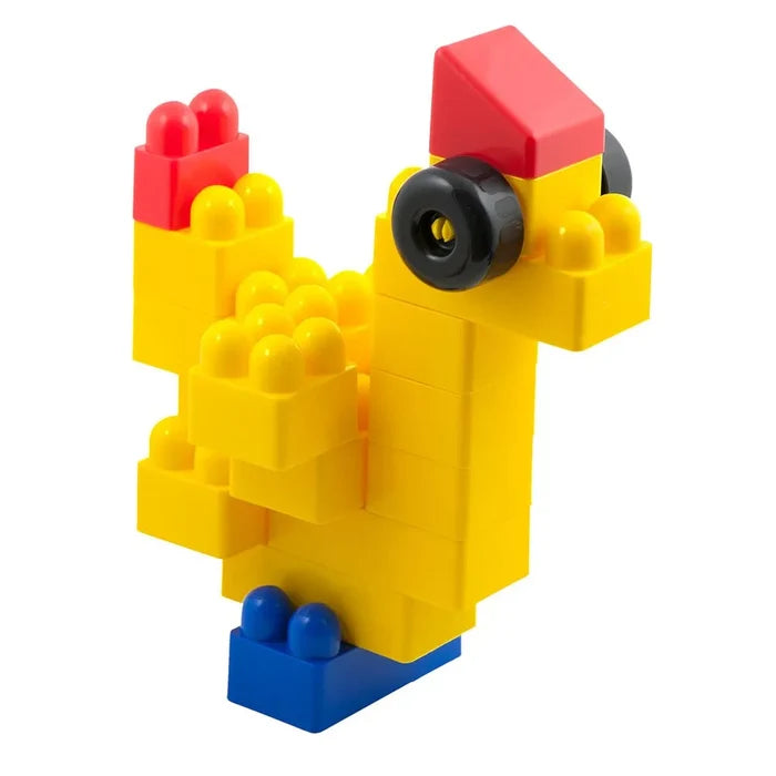 Yellow toy bird built from large plastic blocks with red crest, blue feet, and black wheel eyes.