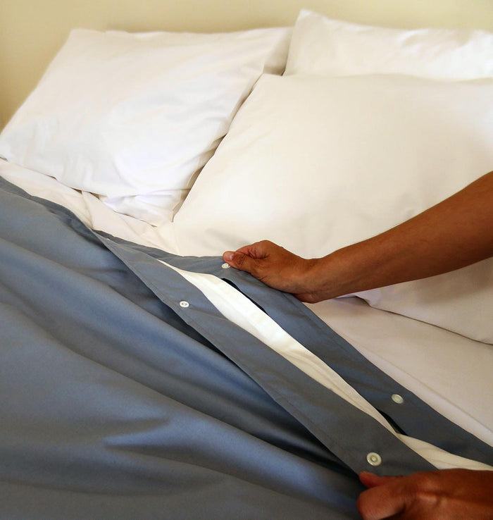 MiteGuard cotton duvet cover in neutral color with soft fabric, designed for comfortable, allergen-protected bedding.