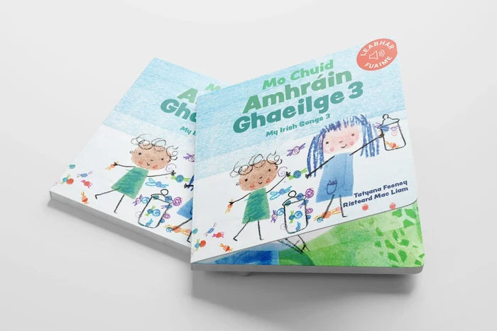 Two light blue Irish sound books featuring crayon-style illustrations of children and flowers on the covers.