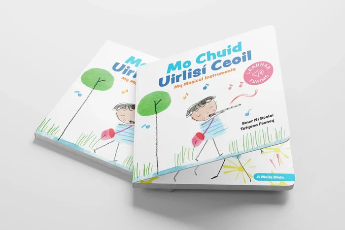 Two white board books titled Mo Chuid Uirlisí Ceoil with a hand-drawn illustration of a child playing a flute.