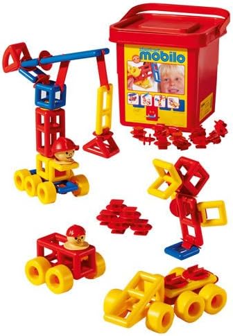 Red bucket with lid next to colorful plastic block models of a crane, truck, and figures in red, yellow, and blue.