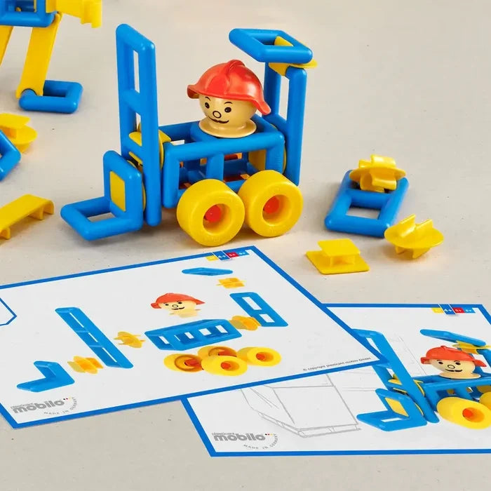 Blue and yellow plastic building set shown as a constructed forklift with a driver figure and instruction cards.