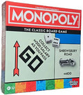 Red Monopoly box featuring the GO space, dice, silver car token, and the blue Shrewsbury Road property.