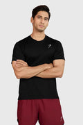 Black Motion Running T-shirt by Fuaark Nz, featuring lightweight fabric and athletic fit, displayed on a hanger.