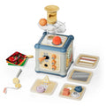 Blue and wood activity cube featuring a top ball run, gears, and several removable shape-sorting and sensory panels.