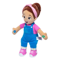 Plush doll with brown hair in a bun, pink headband, pink shirt, blue overalls, and pink sneakers.