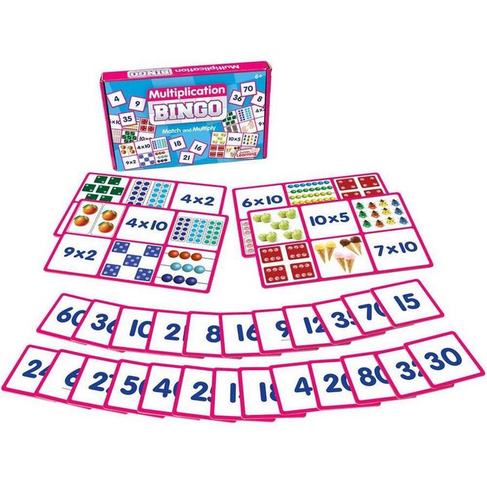 Pink bingo game boards with math problems and illustrations, plus blue number cards and a colorful matching box.