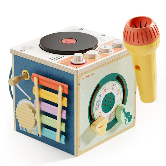 Wooden musical activity cube featuring a turntable top, colorful xylophone bars, and a yellow toy microphone.