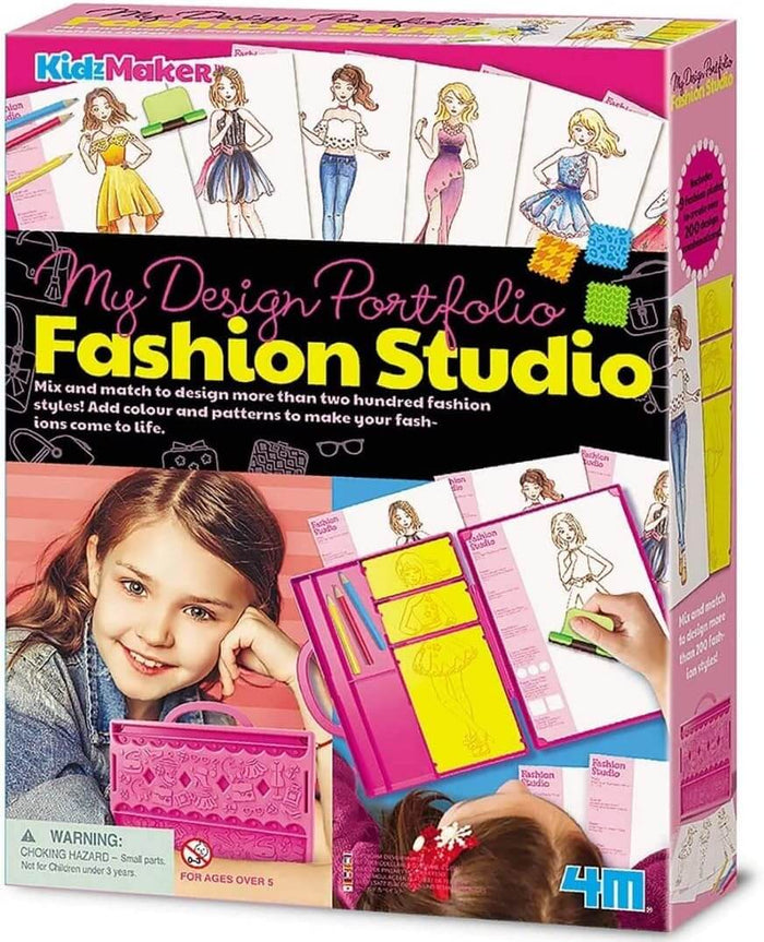 KidzMaker toy box showing a girl using a pink portable case with yellow drawing plates and fashion model sketches.