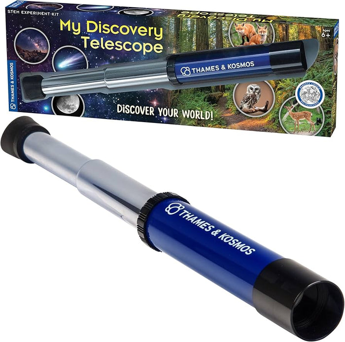 Handheld blue and silver telescope in front of its illustrated box showing stars, the moon, and forest animals.