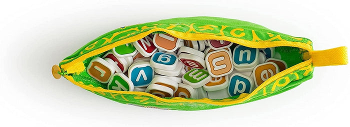 Green banana-shaped pouch with a yellow zipper filled with white tiles featuring colorful lowercase letters.