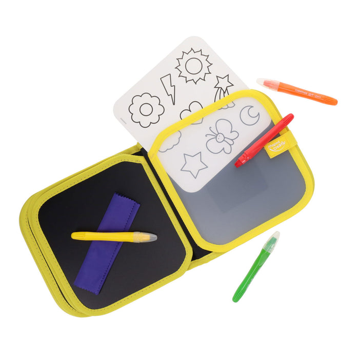 Open yellow travel book with chalkboard, drawing prompts, cleaning cloth, and four colorful chalk markers.