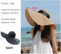 Navy women's 16cm wide brim straw sun hat with floppy derby style for summer beach wear, from dealonlinenz.