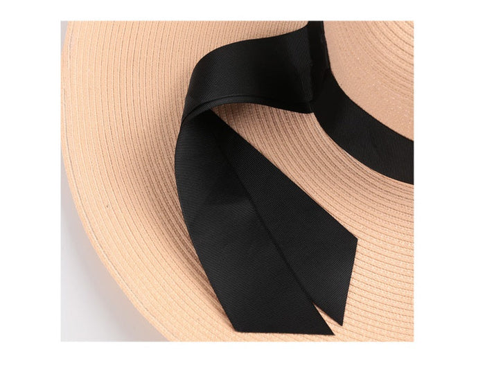 Navy women’s sun straw hat with 16cm wide floppy brim, perfect for summer beach outings, by dealonline.co.nz