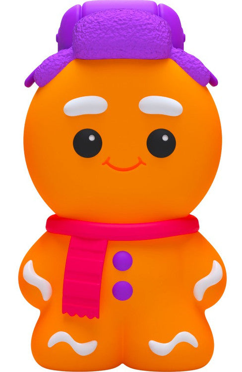 Orange gingerbread man figure with a purple winter hat, pink scarf, purple buttons, and white icing details.