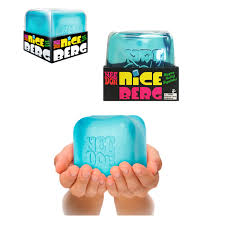Translucent teal squishy cube with embossed text, shown in black packaging and being held in a pair of hands.