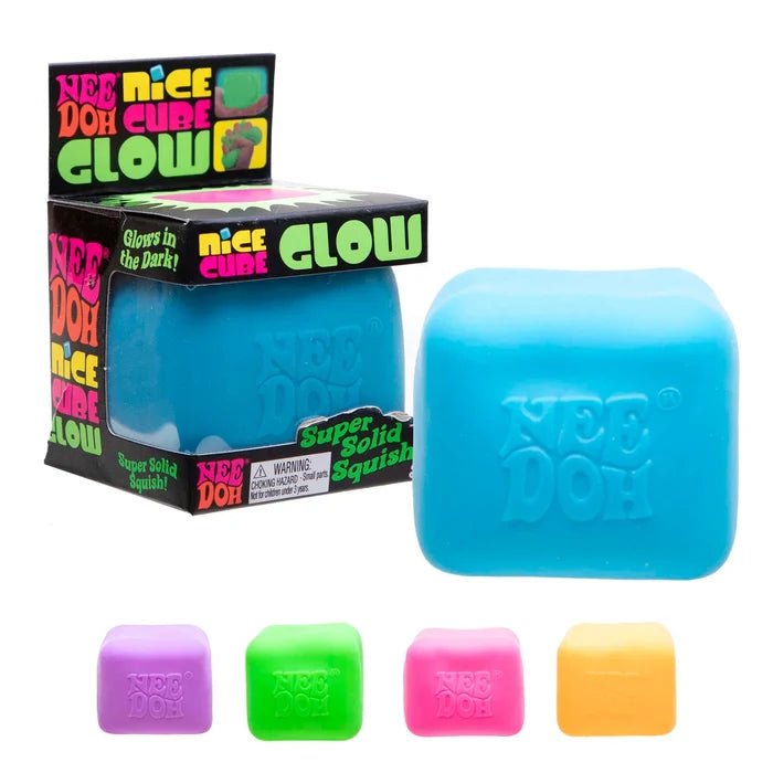 Large blue squishy cube, black retail box, and four smaller cubes in purple, green, pink, and yellow.