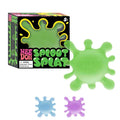Green splat-shaped squishy toy next to its black packaging, with small blue and purple splats shown below.