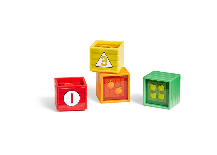 Colorful toy crate blocks in red, orange, yellow, and green with numbers and matching fruit illustrations.