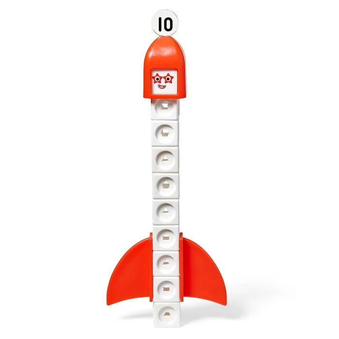 Ten white blocks stacked into a rocket with orange fins, a red helmet with star eyes, and a number 10 disc on top.
