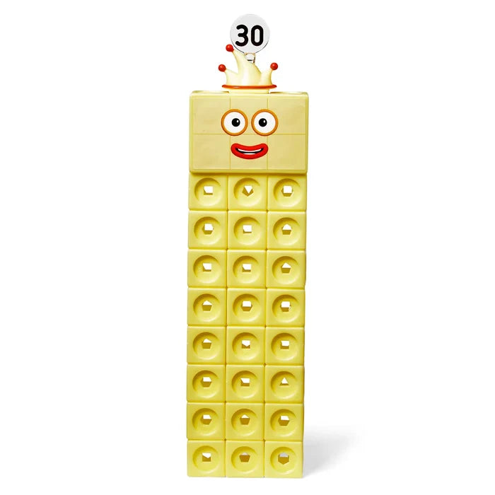Pale yellow Numberblock 30 figure made of 30 interlocking cubes with a smiling face, crown, and number 30 topper.