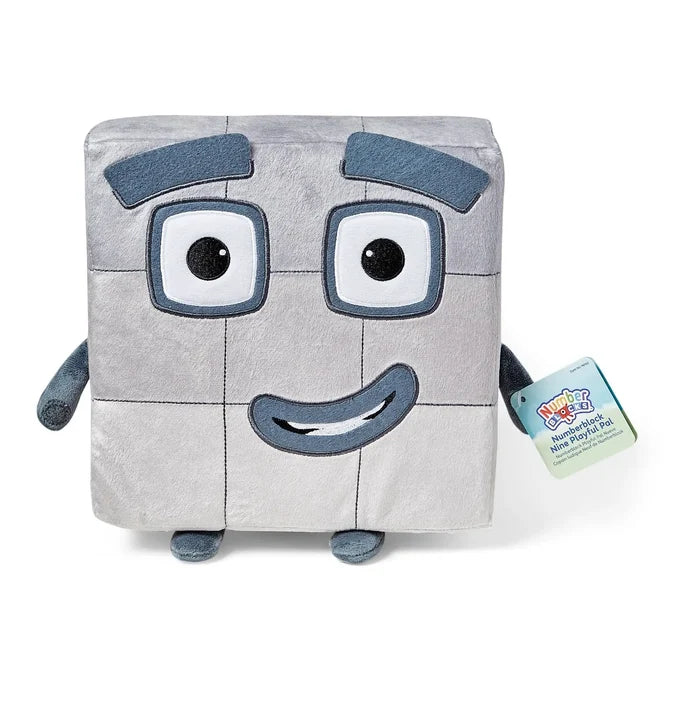 Square grey plush toy with a 3x3 grid, large blue-framed eyes, a smile, small limbs, and product tag.